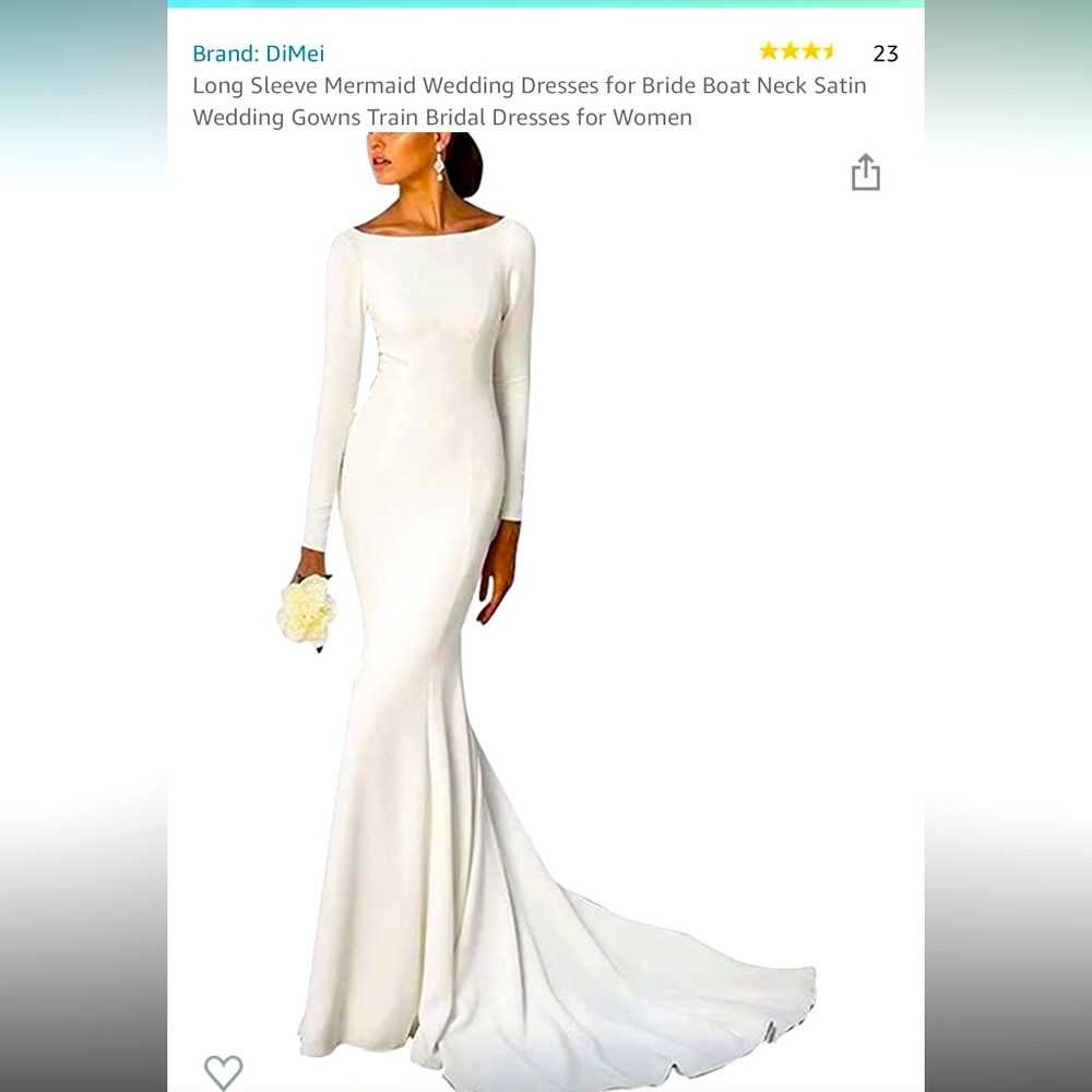 Ivory wedding dress, fits like a size 12. Never been worn and still in the bag.